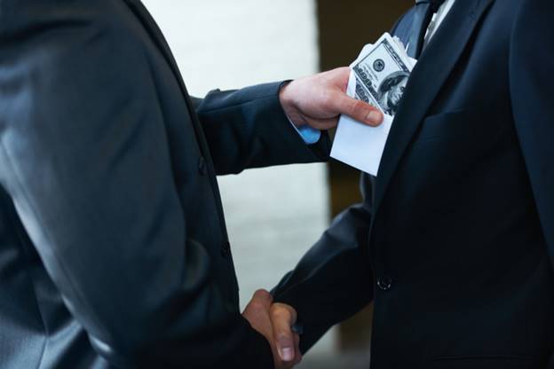 A person in a suit taking money from his pocket

AI-generated content may be incorrect.